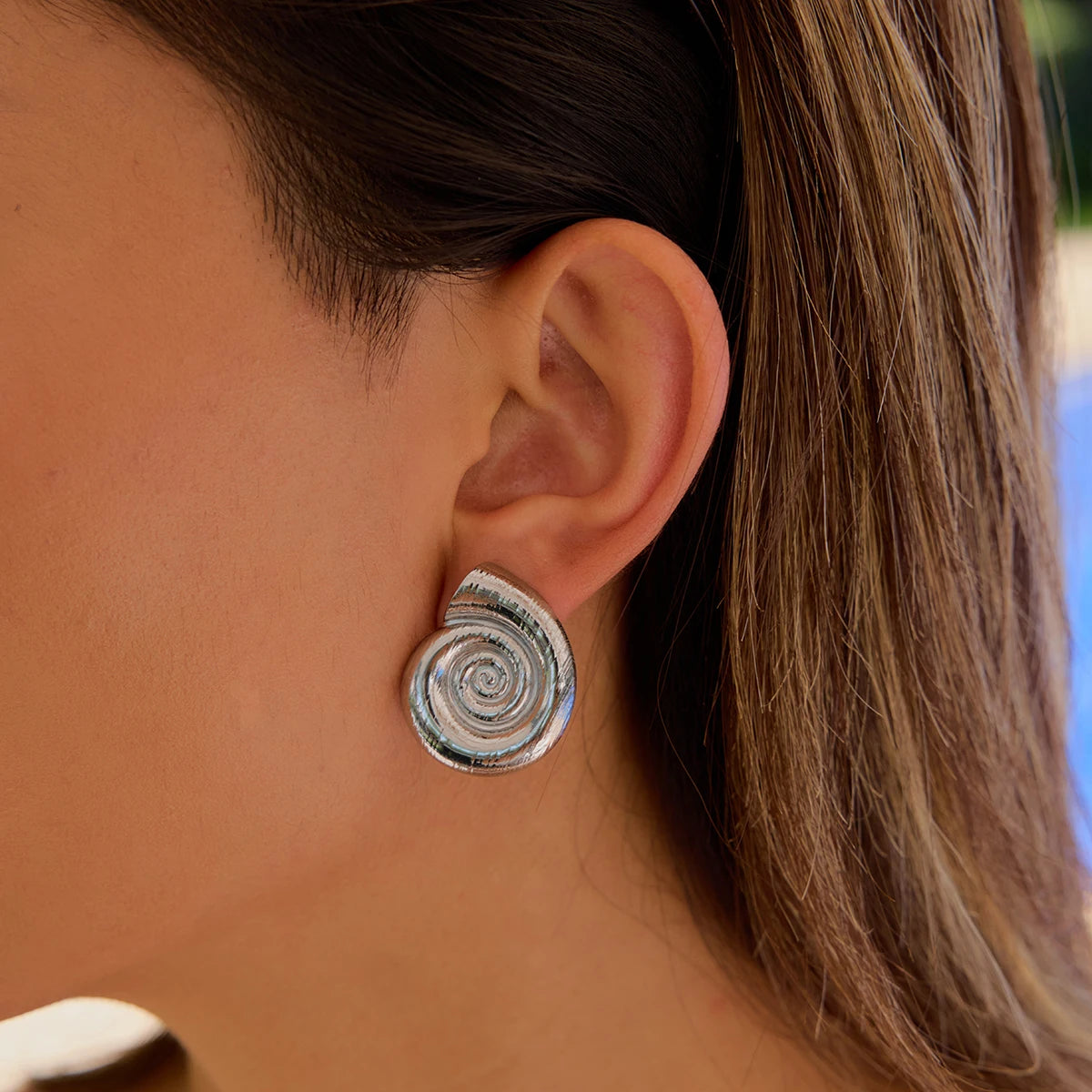 Spiraling Conch Stud Earrings