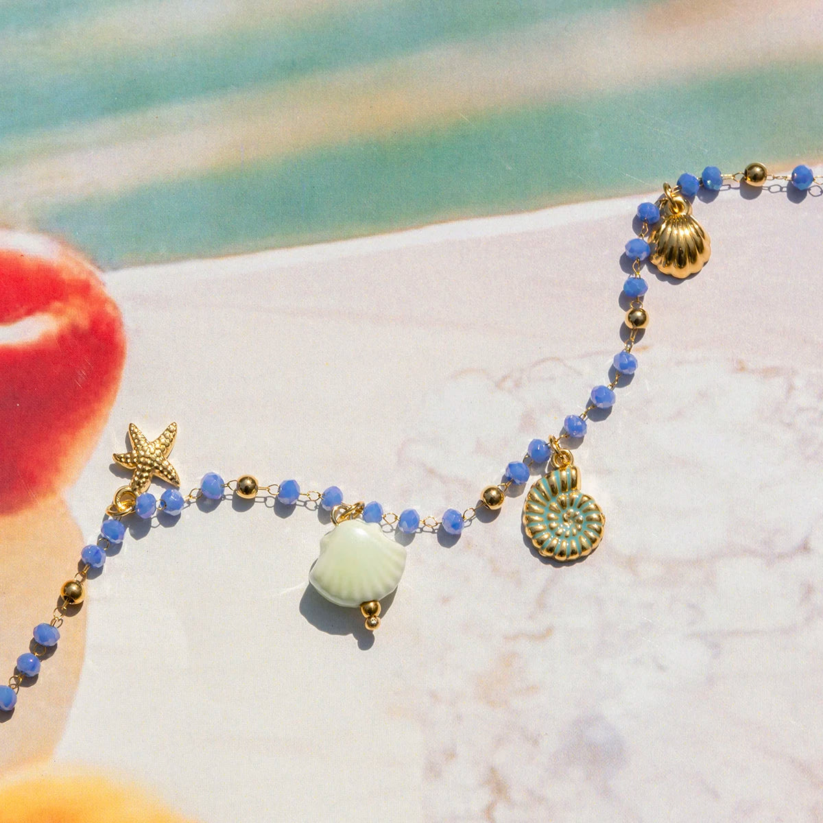 Light-Blue Ceramic Beads Bracelet with Sea Charms