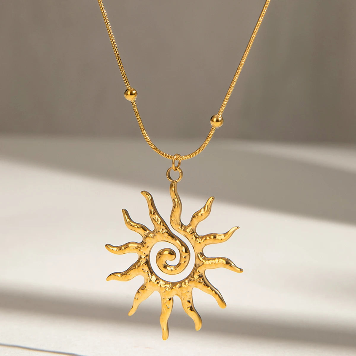 Spiraling Sun Pendant